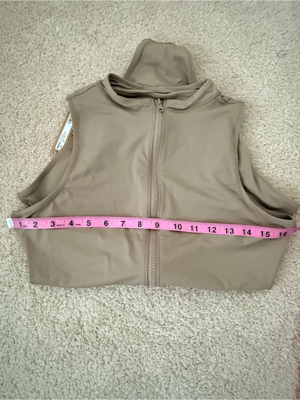 SKIMS Sleeveless Front-Zip Bathingsuit in color Desert - Picture 8 of 11